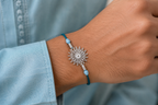 Silver Filigree Sunburst Rakhi - front view